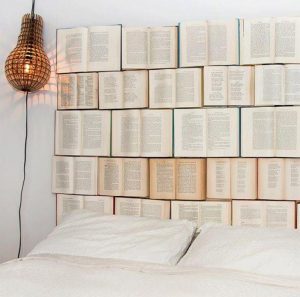 Upcycle your old books by turning them into a headboard for your bed.