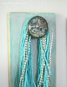 How to turn old jewelry into amazing drawer pulls courtesy of www.lovelyetc.com