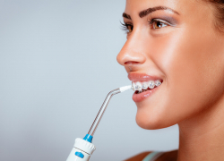 2022’s Best Water Flossers Are The Safe & Easy Way To Achieve Healthy Teeth & Gums